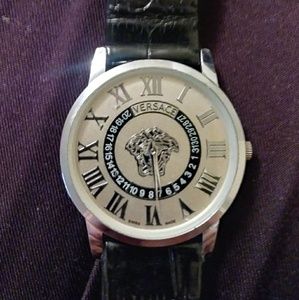 Versace watch. Stamped tet for sure. Real leather